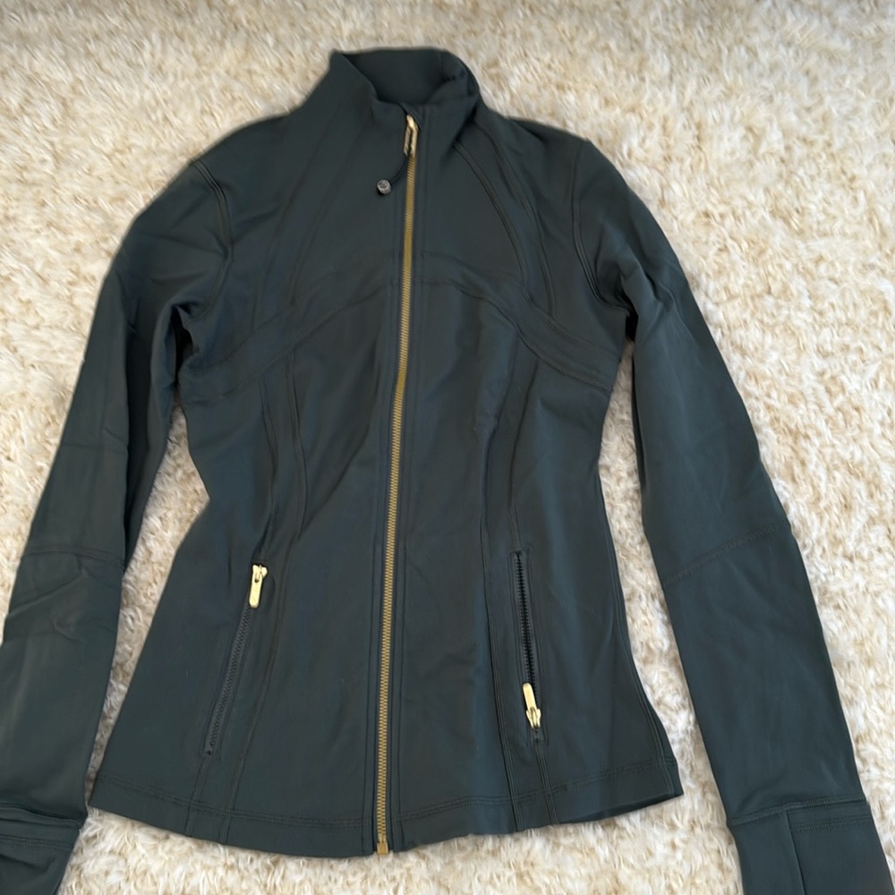 Dark Green Lululemon define jacket with gold zipper